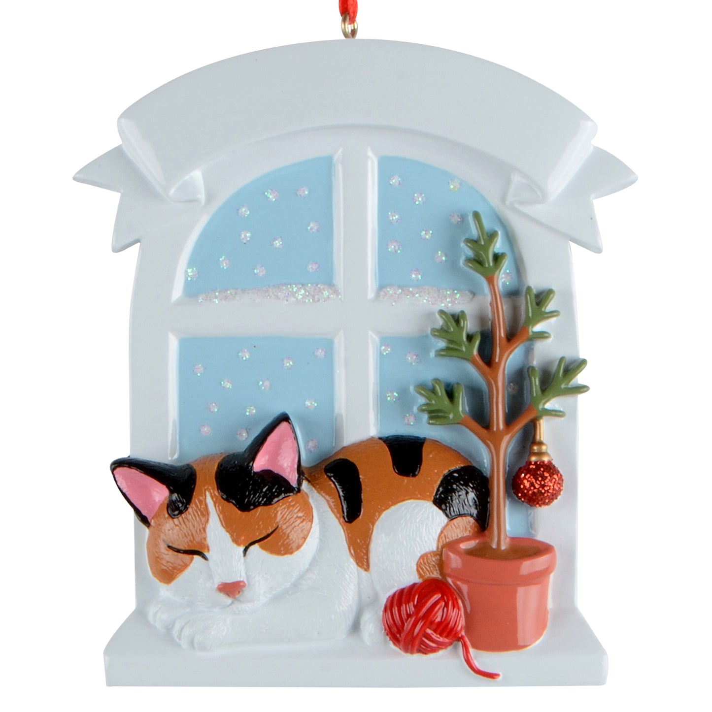 Calico cat sleeping beside potted tree and ball of yarn in arched window frame holiday ornament