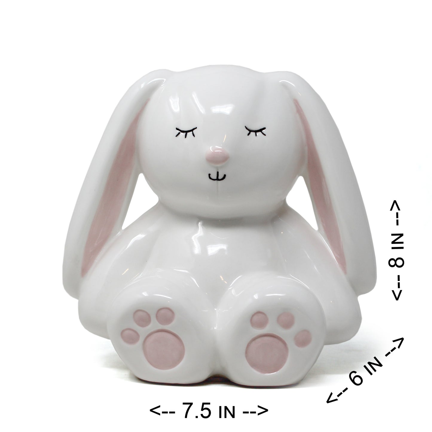Front view of white ceramic bunny piggy bank showing dimensions 7.5 in width, 6 in depth, 8 in height