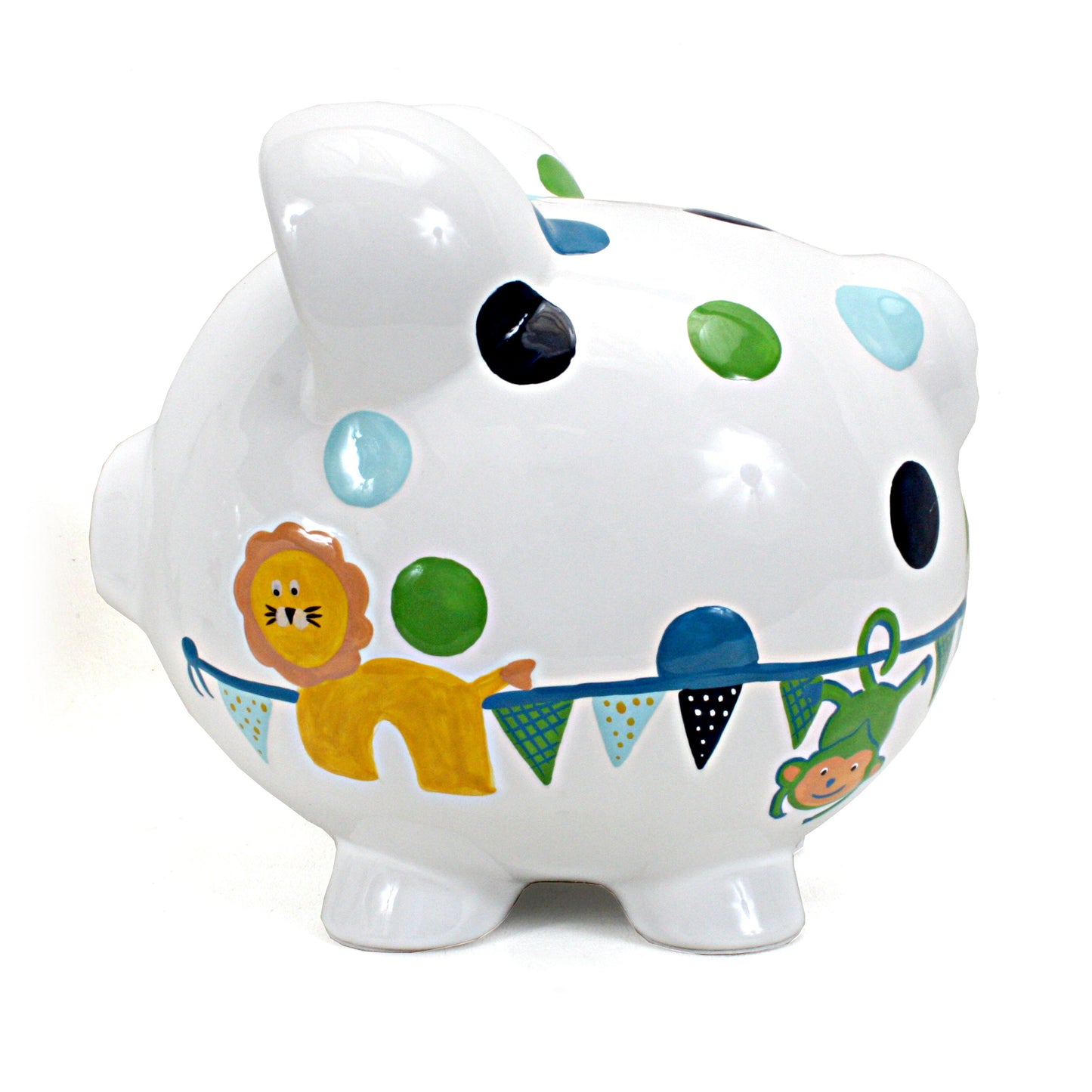 Another side angle showing the handpainted lion and monkey near the base of the piggy bank decorated with blue and green polka dots