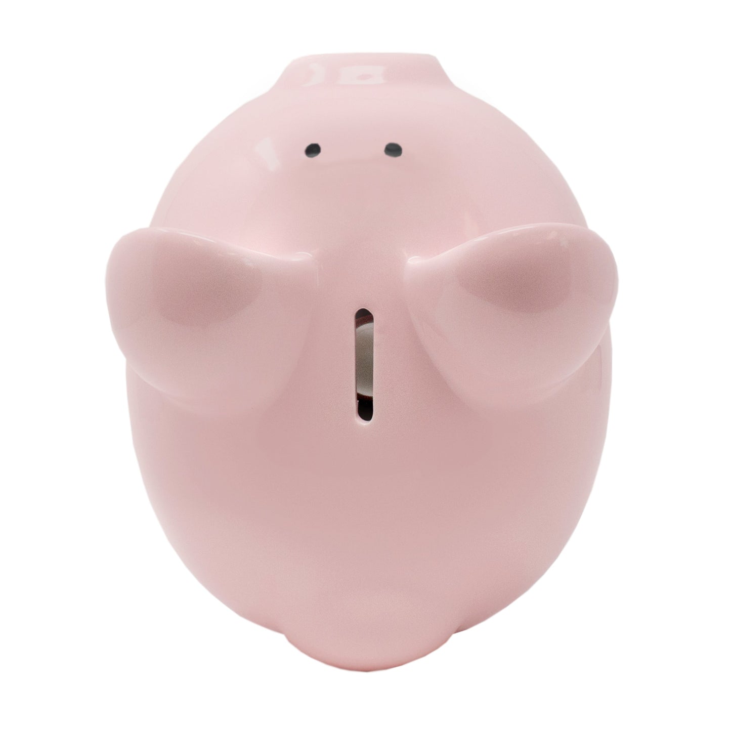 Top view of pink piggy bank showing coin slot between ears