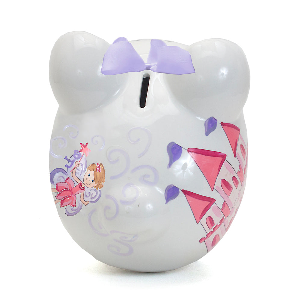 Top view showing coin slot and lavender bow on ceramic piggy bank