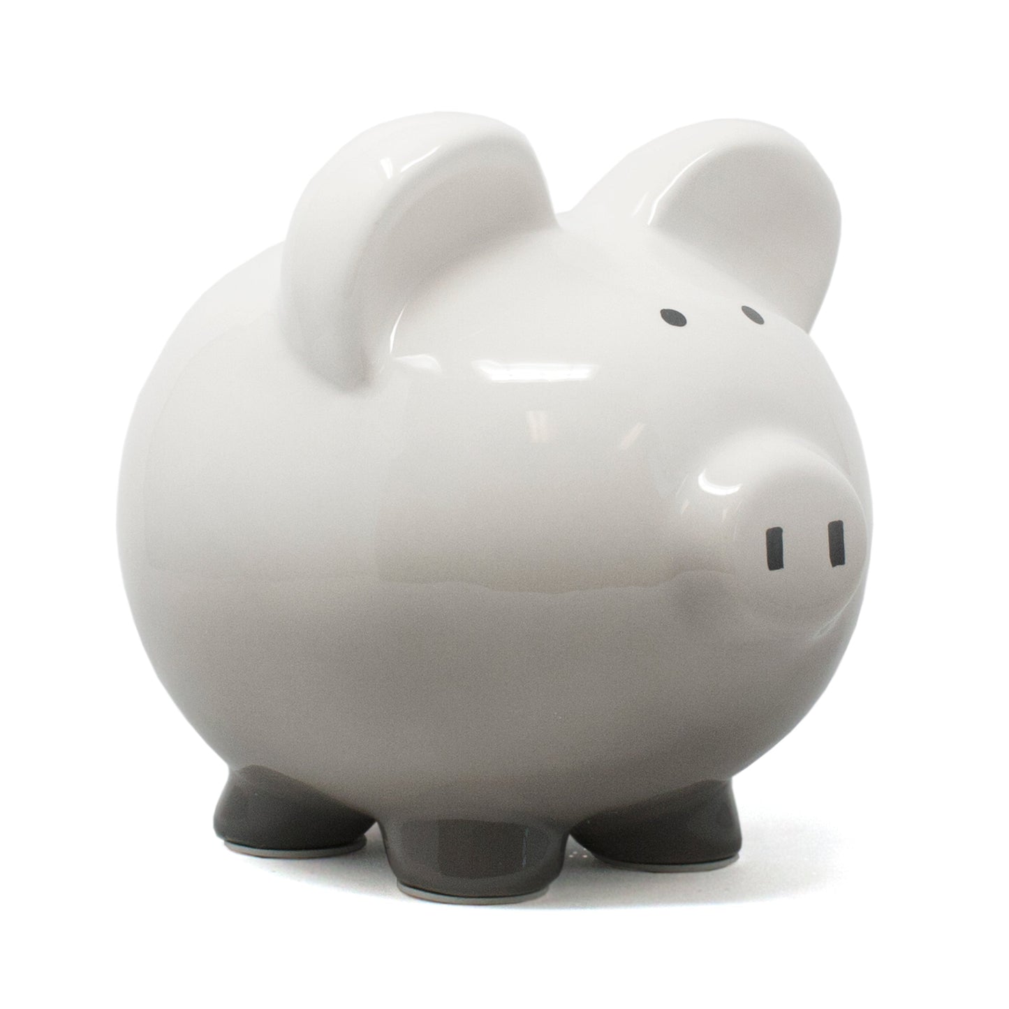 Gray ombre ceramic piggy bank shaped like a pig with black painted eyes and nostrils on white background