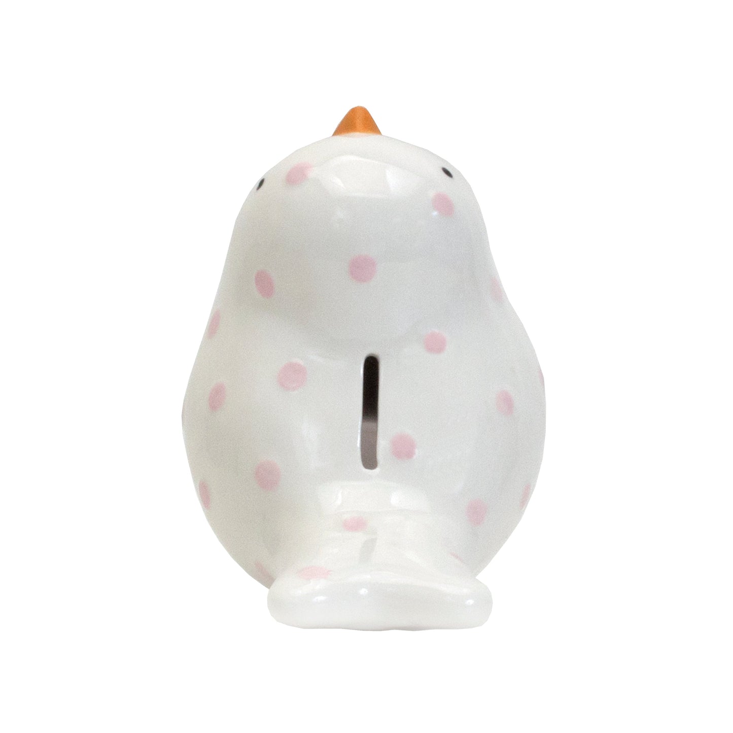 Bottom view showing coin slot on white ceramic bird piggy bank with pink polka dots