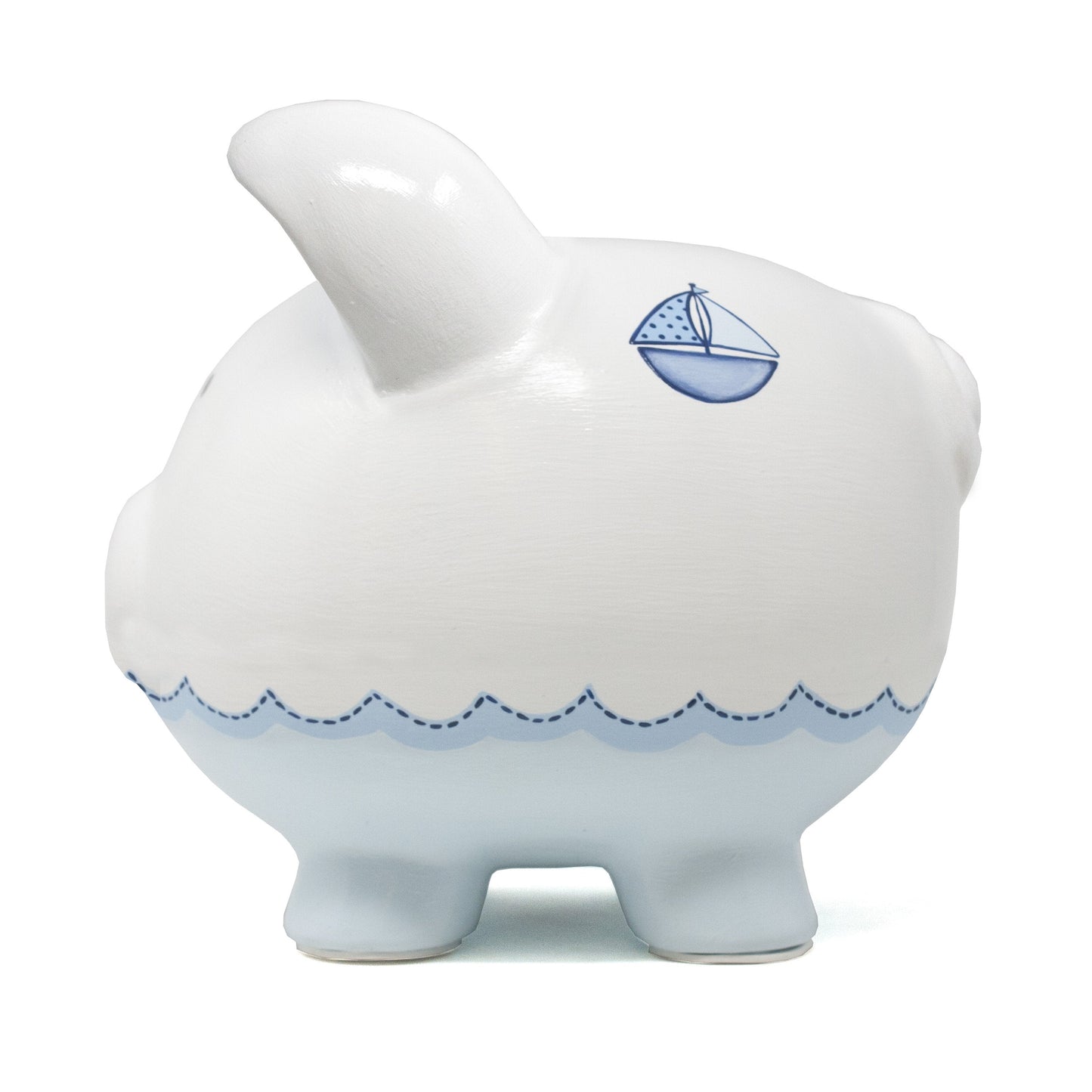Opposite side view showing single sailboat and the piggy bank's rounded form with soft blue base