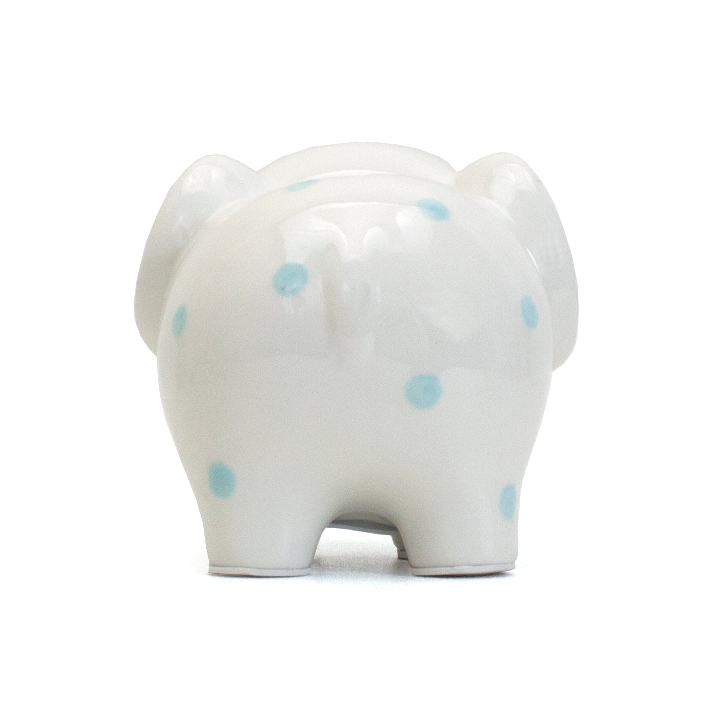 Angled side view of white ceramic elephant piggy bank