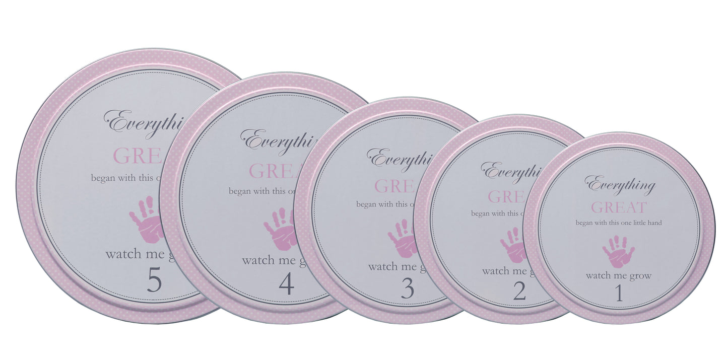 Set of five nested pink tins from size 1 to 5
