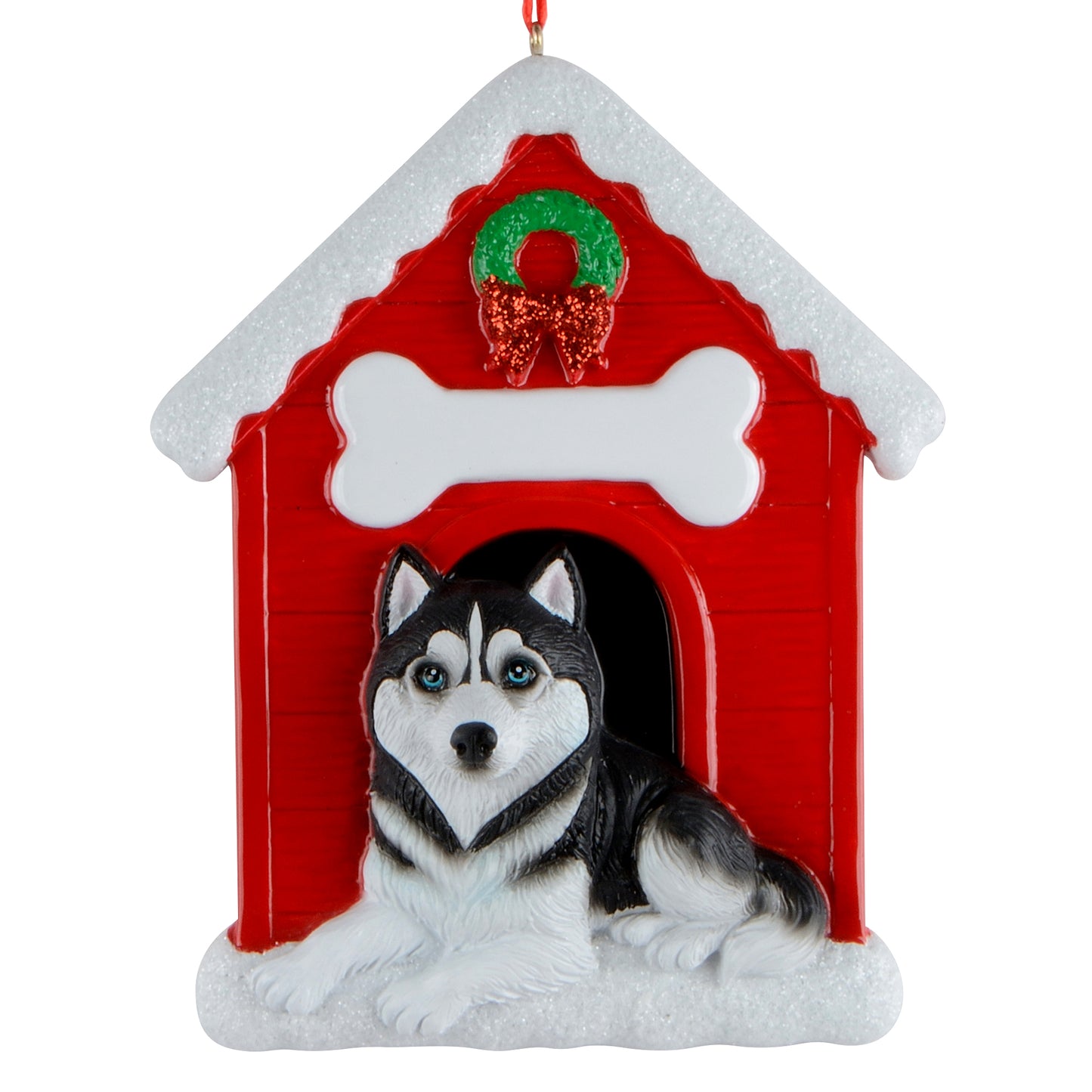 Handpainted Siberian Husky sitting in front of red doghouse ornament with white bone and green wreath with red bow