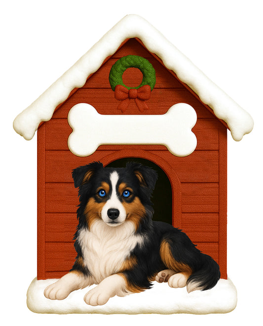 Handpainted tricolor Australian Shepherd dog resting in front of a snow-topped red doghouse decorated with a green wreath and white bone plaque