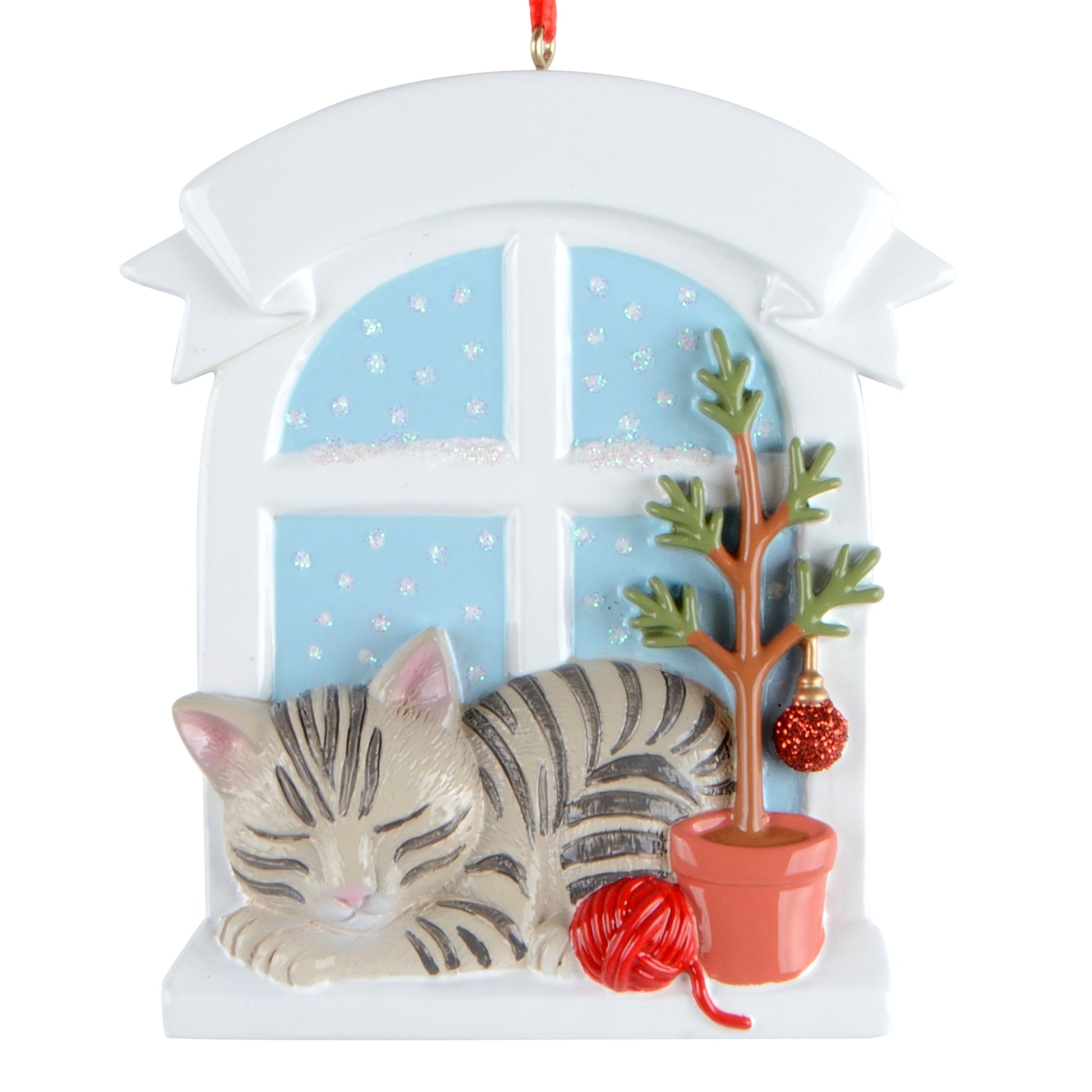 Handpainted gray tabby cat sleeping by a white window with glitter snow, red yarn ball, and small potted tree ornament