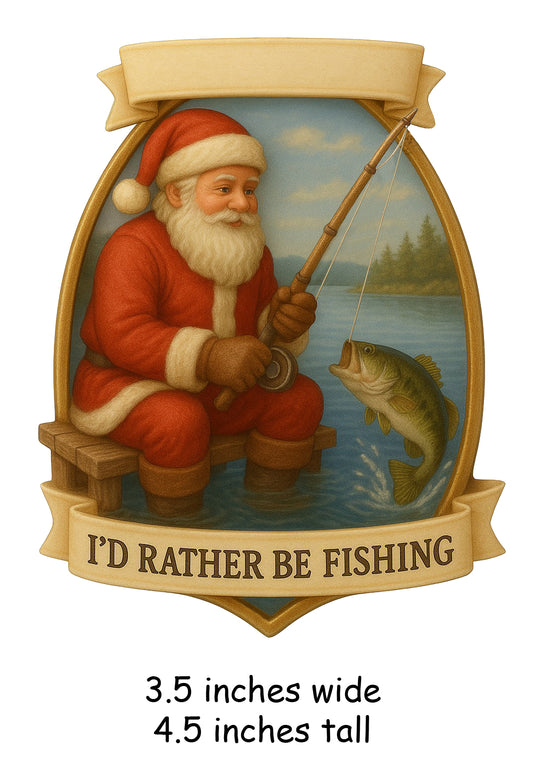 Handpainted holiday ornament featuring Santa Claus in red suit fishing on a wooden dock with a fish on the line and banner that reads I'd Rather Be Fishing