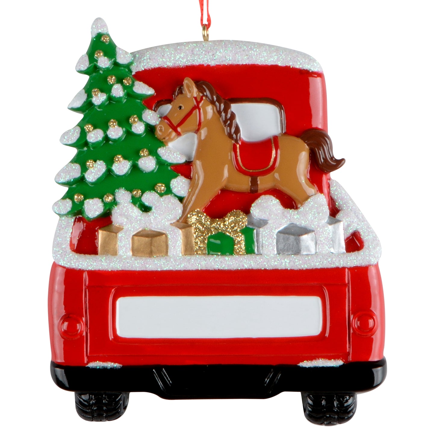 Rear view of red truck Christmas ornament with presents, rocking horse, glitter snow, and decorated tree