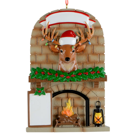 Handpainted holiday ornament of a stone fireplace with a deer wearing a Santa hat and colorful Christmas lights on antlers