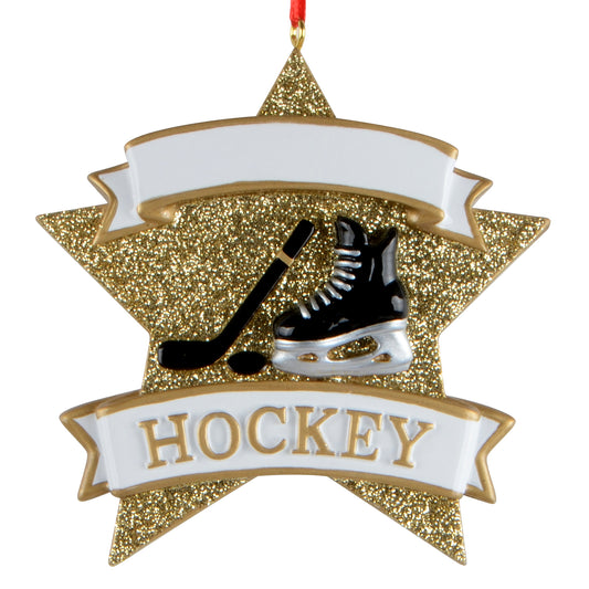 Gold glitter star shaped holiday ornament with black hockey skate and stick, white banners, and red hanging ribbon