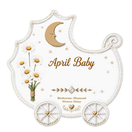 Handpainted April Baby ornament shaped like a carriage with daisies, gold moon, and heart wheels