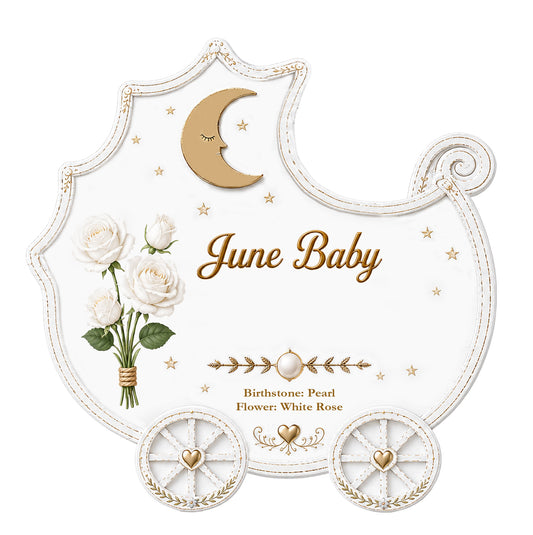 Handpainted June Baby ornament shaped like a baby carriage with white roses, a pearl accent, and gold details