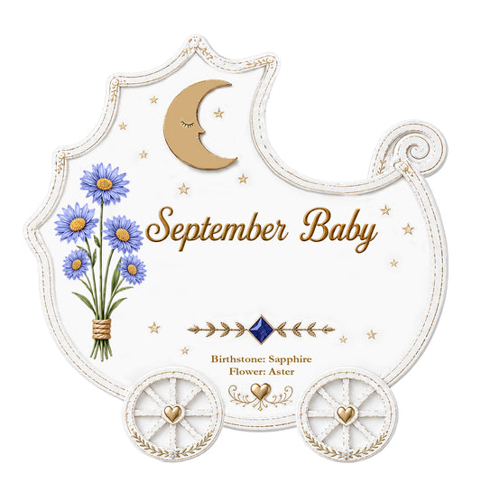 September Baby keepsake ornament shaped like a baby carriage with handpainted asters, crescent moon, and sapphire birthstone accent