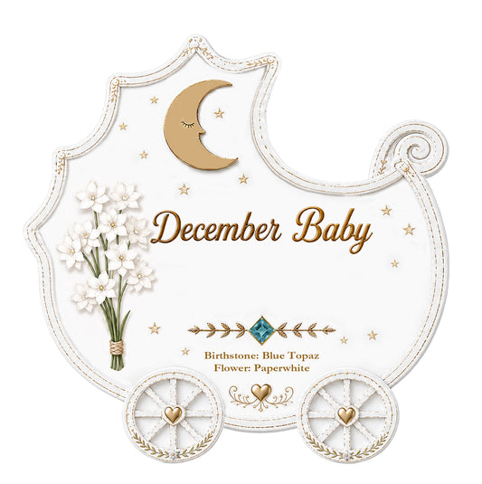 Handpainted December Baby ornament shaped like a baby carriage with gold accents, Blue Topaz birthstone, and Paperwhite flower illustration