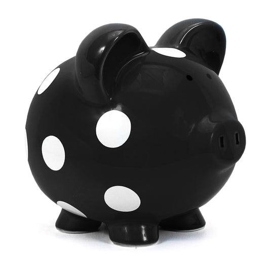 Black ceramic piggy bank with white polka dots angled left