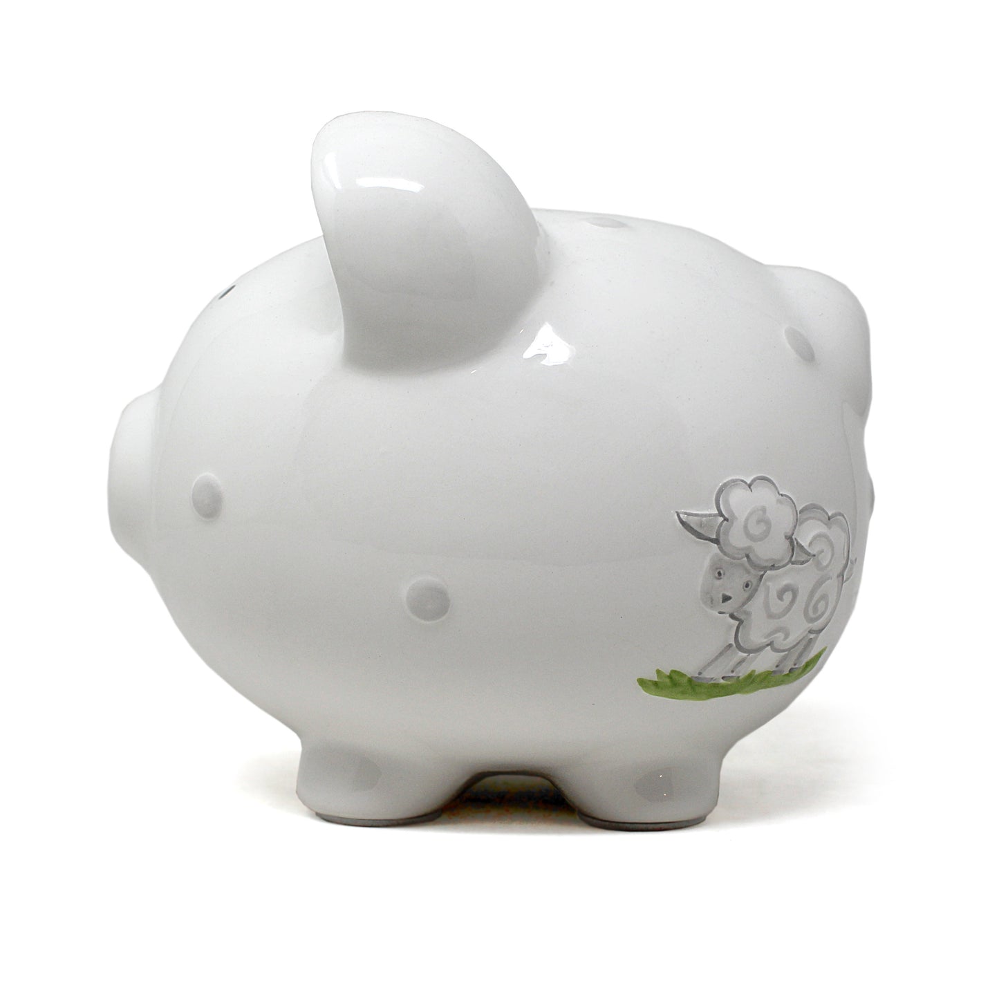 Side view of white ceramic piggy bank featuring two gray lambs and green grass