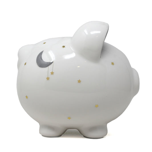 White ceramic piggy bank with handpainted golden stars and gray crescent moon on side