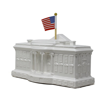 Angled back center view showing white glossy finish and flag on top