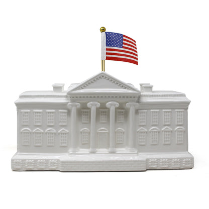 Right side close-up view of White House piggy bank showing columns and brick design