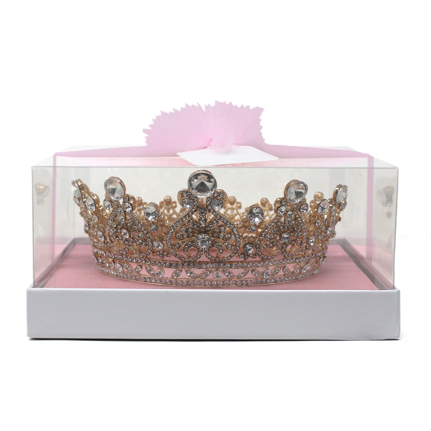 Gold children's crown with intricate design and clear rhinestones displayed in a clear plastic box with pink base