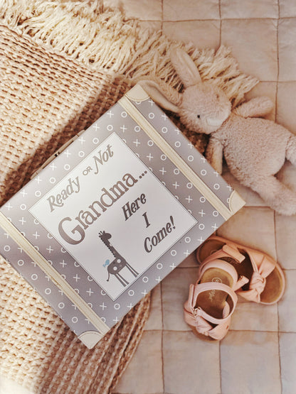 Suitcase lying on a rug beside child's shoes and stuffed rabbit, showing playful nursery setting