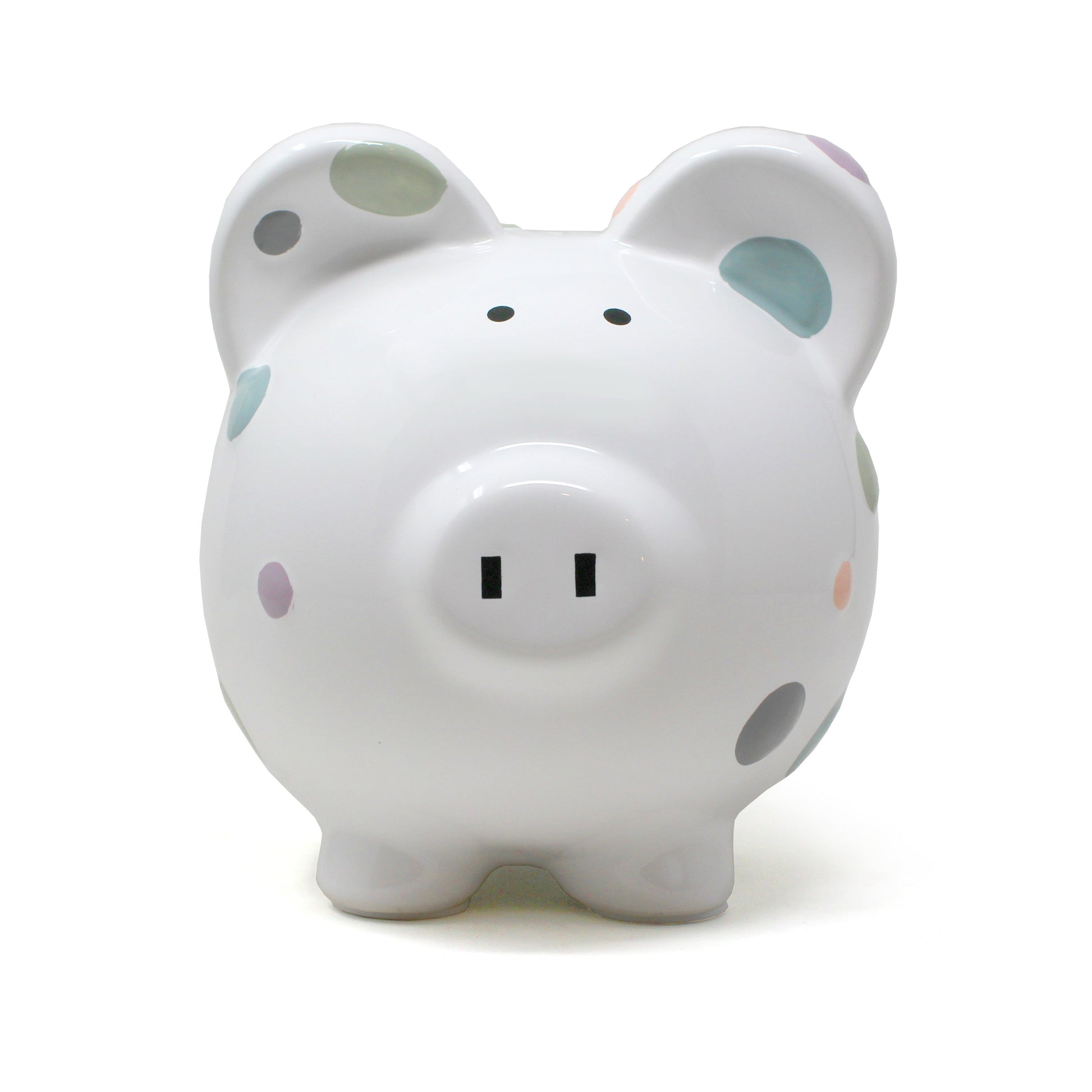 Back view showing more pastel polka dots on white glazed ceramic piggy bank
