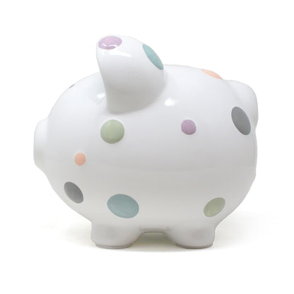 Front view of the piggy bank focusing on simple black eyes and snout details