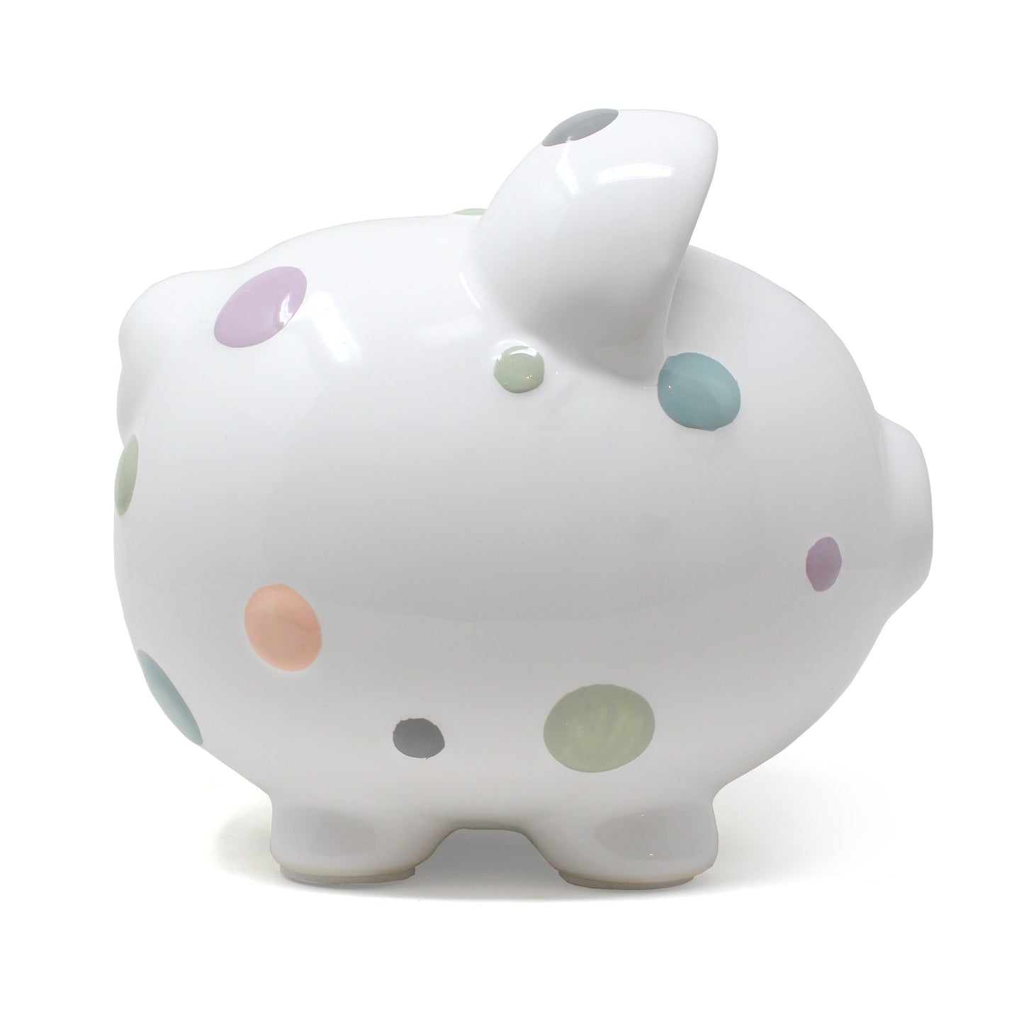 Another side view of pastel polka dot piggy bank displaying rounded shape and colorful dots