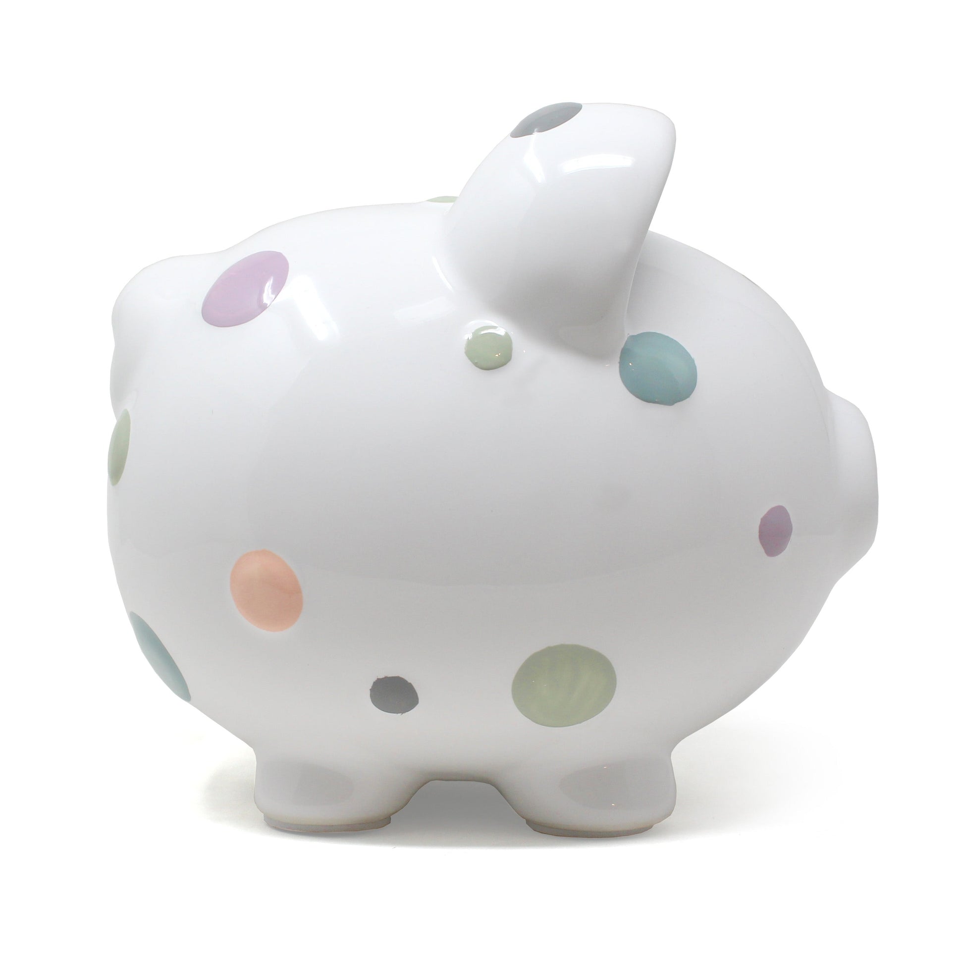Another side view of pastel polka dot piggy bank displaying rounded shape and colorful dots