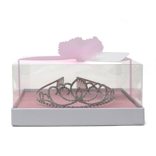 Silver rhinestone tiara displayed in clear gift box with pink base and bow