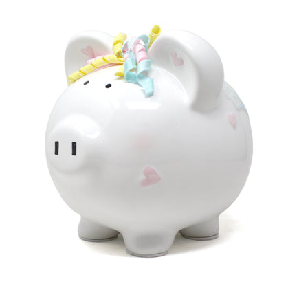 Back side of piggy bank highlighting glitter rainbow and cloud details