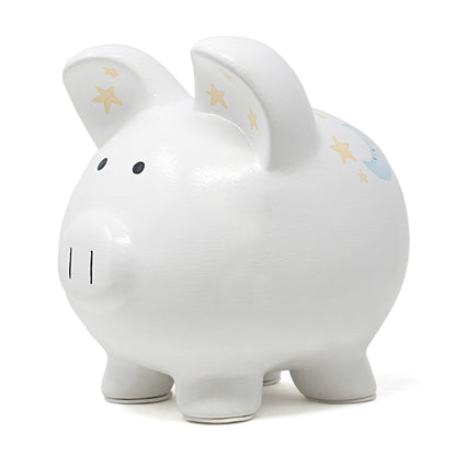 Side view of piggy bank featuring animal characters and brown woven basket of hot air balloon