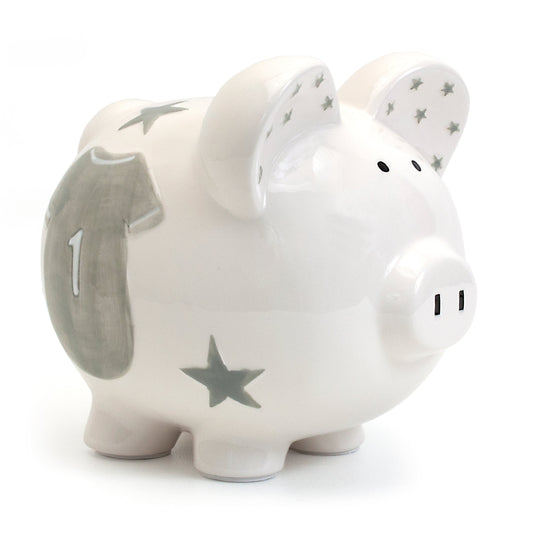 Side view of white ceramic piggy bank with gray stars and jersey design