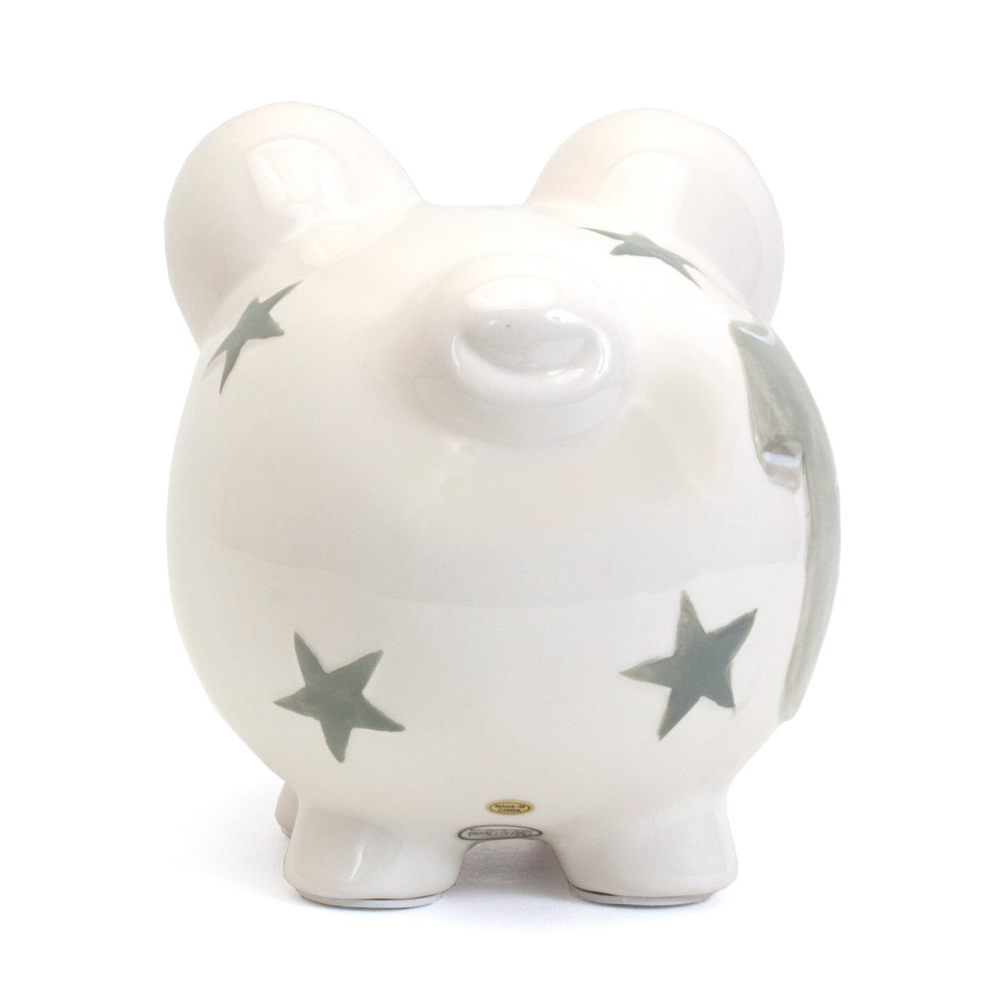 Back view of white ceramic piggy bank showing star patterns on ears and body