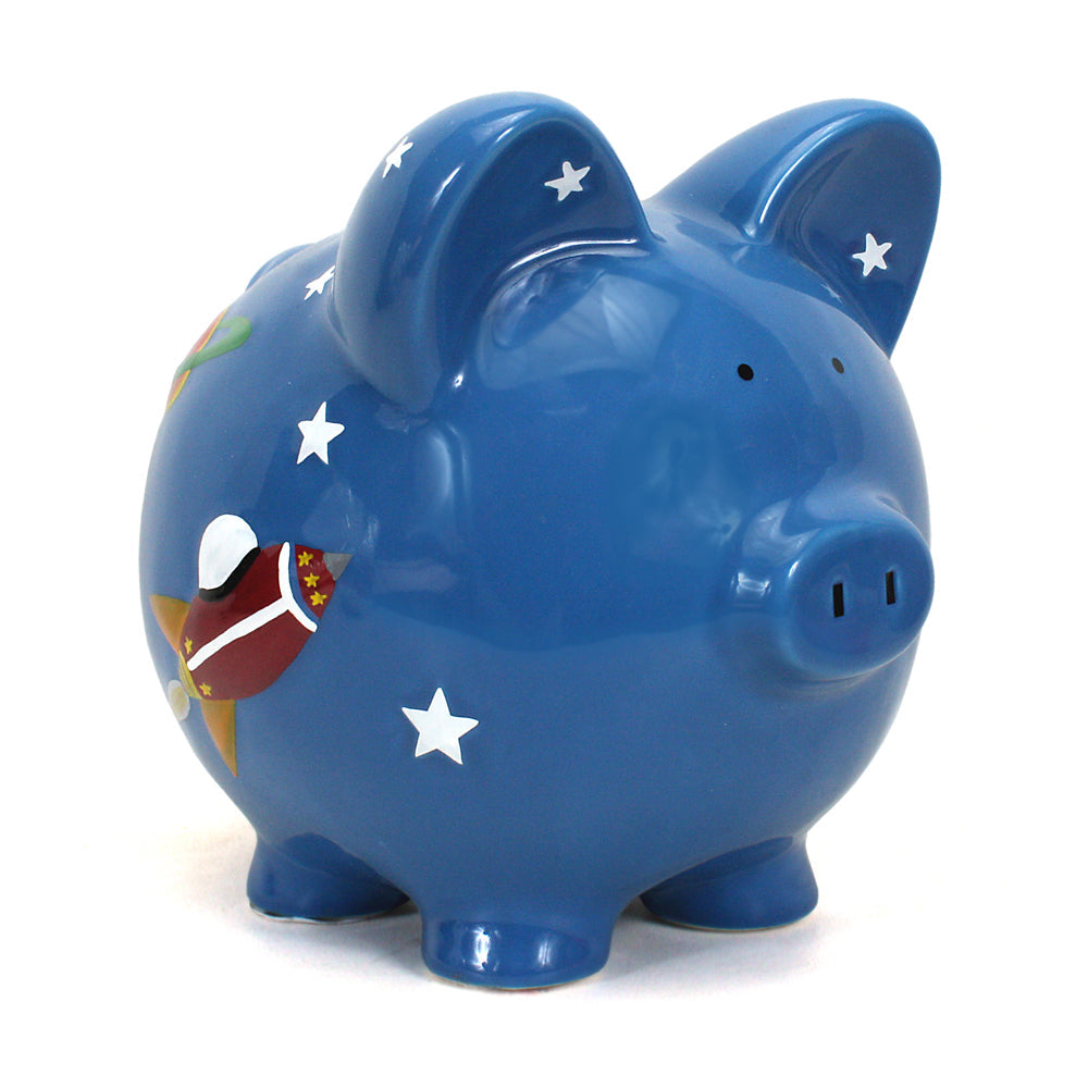 Blue ceramic piggy bank with space rocket and star designs, front side view