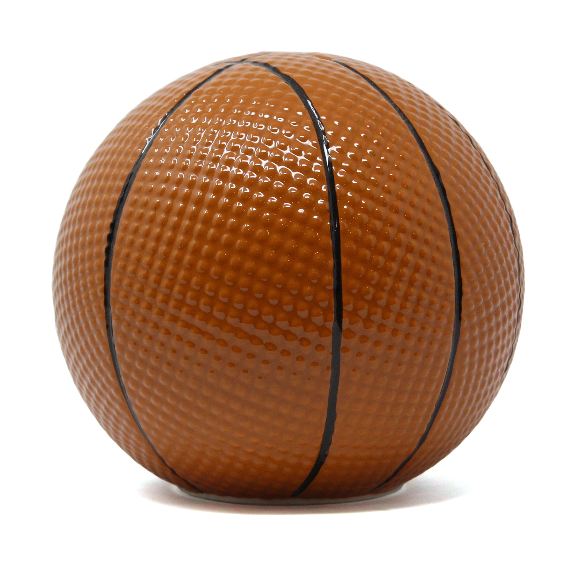 Basketball-shaped ceramic piggy bank with textured surface and black lines