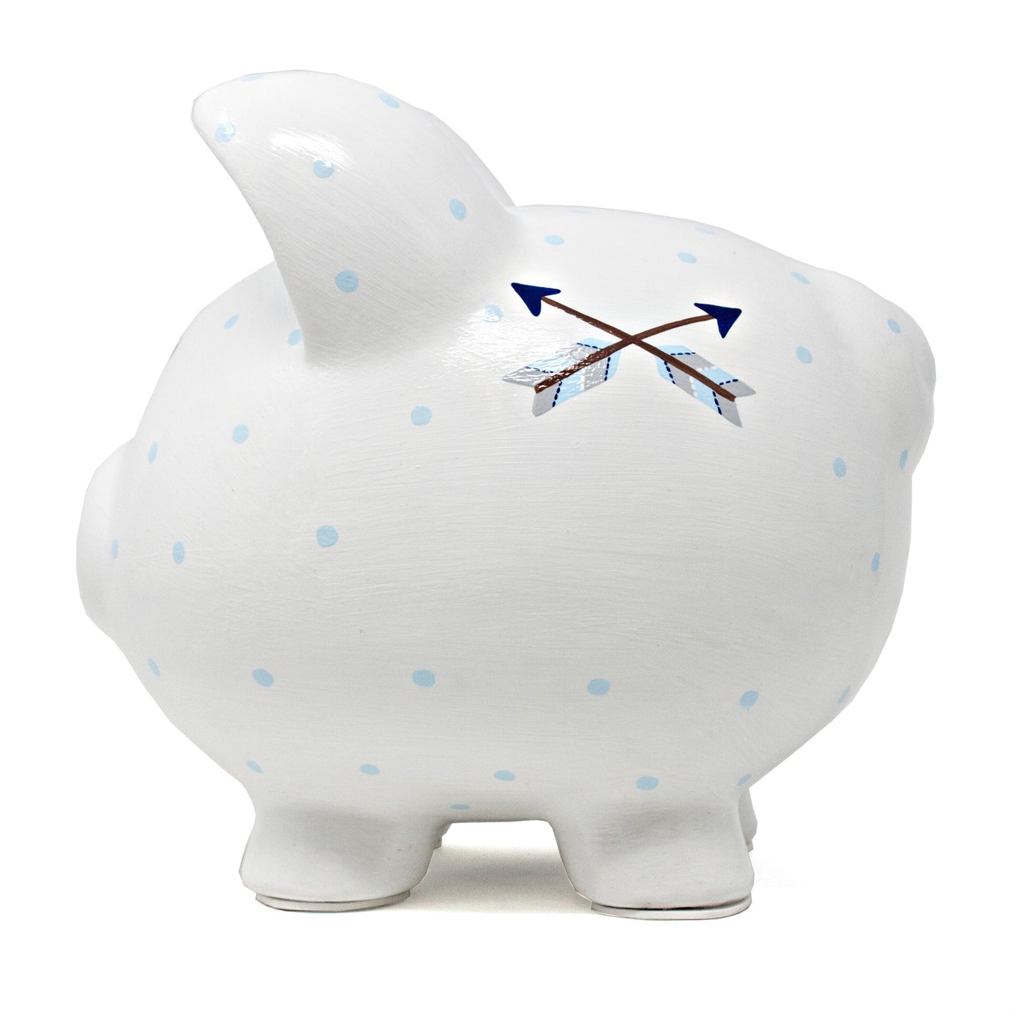 Top view of white ceramic piggy bank showing coin slot and blue polka dot details with crossed arrows