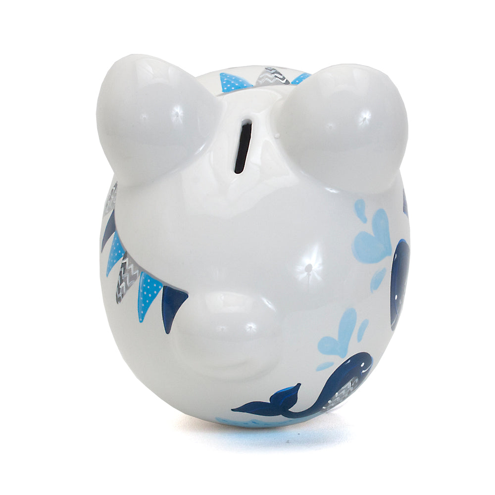 Top-down angled view of piggy bank highlighting whale design and gloss finish