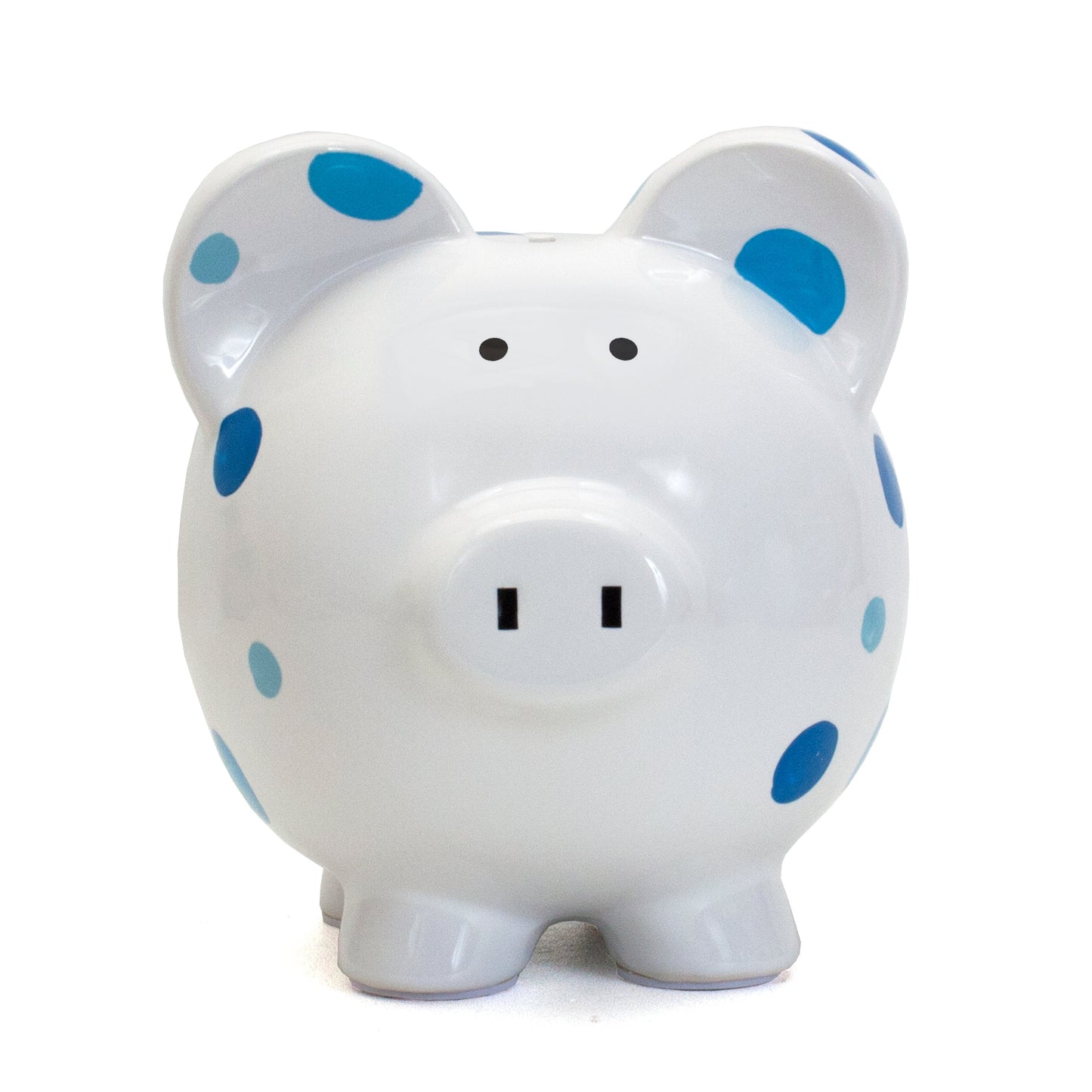 Front view of white piggy bank featuring blue polka dots and coin slot
