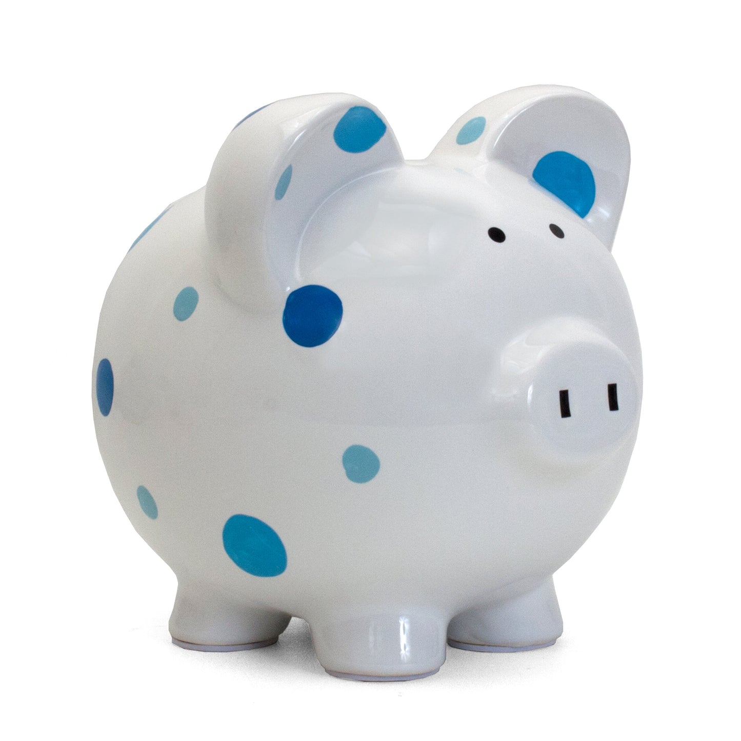 White ceramic piggy bank with blue and light blue polka dots front angled view