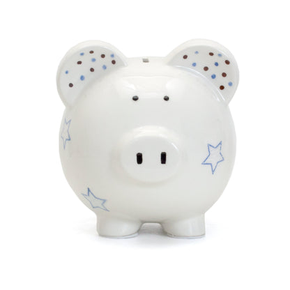 Front view of white ceramic piggy bank with blue star accents on ears and body