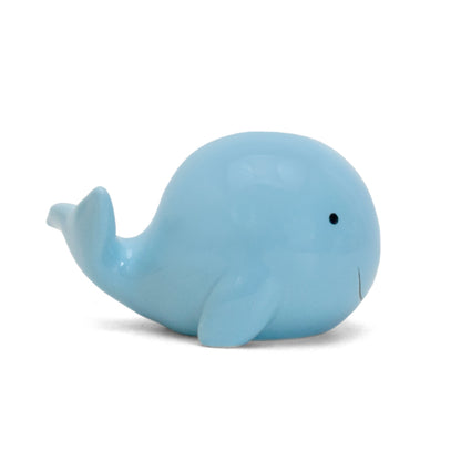 Left side profile of light blue whale shaped ceramic piggy bank