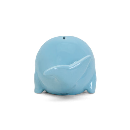 Back view showing coin slot and wide tail fin on blue whale bank