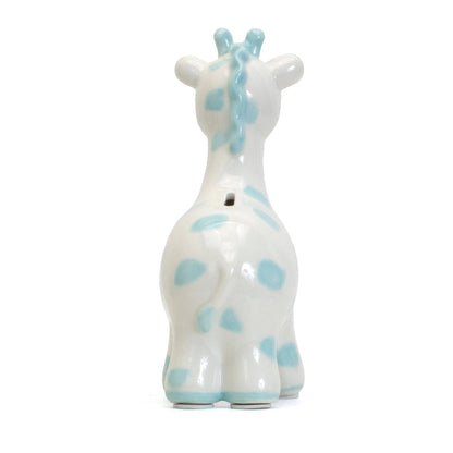 Back view of blue spotted ceramic giraffe showing coin slot