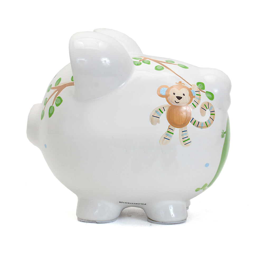 Side view showing elephant and partial giraffe on piggy bank