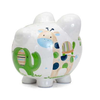 View of piggy bank slot on top with visible painted monkey and giraffe