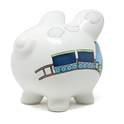 Quarter angled view of piggy bank highlighting the train cart details and smooth white base